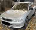 Сірий Міцубісі Lancer, об'ємом двигуна 1.3 л та пробігом 555 тис. км за 875 $, фото 1 на Automoto.ua