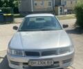 Сірий Міцубісі Lancer, об'ємом двигуна 1.3 л та пробігом 284 тис. км за 1900 $, фото 1 на Automoto.ua