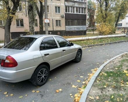 Серый Мицубиси Лансер, объемом двигателя 1.3 л и пробегом 157 тыс. км за 1679 $, фото 1 на Automoto.ua