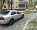 Серый Мицубиси Лансер, объемом двигателя 1.3 л и пробегом 157 тыс. км за 1679 $, фото 1 на Automoto.ua