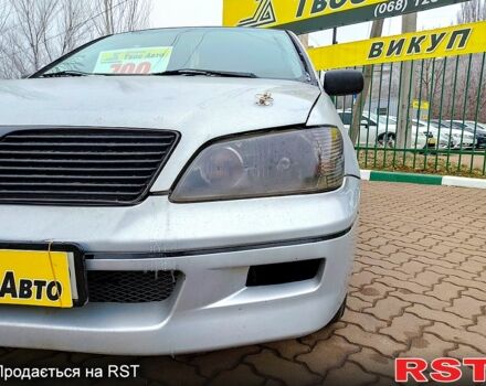 Сірий Міцубісі Lancer, об'ємом двигуна 20 л та пробігом 197 тис. км за 2899 $, фото 5 на Automoto.ua