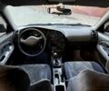 Серый Мицубиси Лансер, объемом двигателя 1.3 л и пробегом 155 тыс. км за 1450 $, фото 11 на Automoto.ua