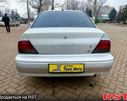 Сірий Міцубісі Lancer, об'ємом двигуна 20 л та пробігом 197 тис. км за 2899 $, фото 3 на Automoto.ua