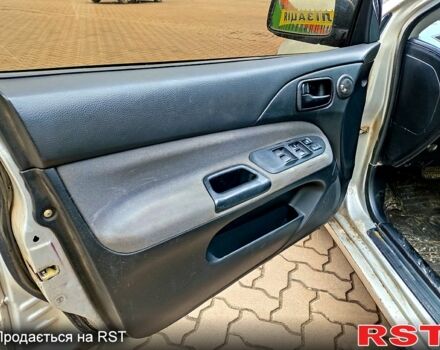 Сірий Міцубісі Lancer, об'ємом двигуна 20 л та пробігом 197 тис. км за 2899 $, фото 7 на Automoto.ua