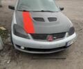 Сірий Міцубісі Lancer, об'ємом двигуна 2 л та пробігом 250 тис. км за 1500 $, фото 1 на Automoto.ua