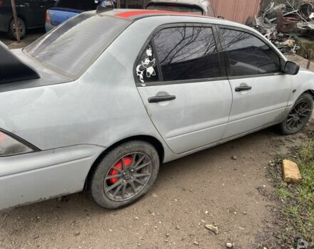 Сірий Міцубісі Lancer, об'ємом двигуна 2 л та пробігом 250 тис. км за 1500 $, фото 3 на Automoto.ua