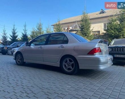 Мицубиси Лансер 2002 в Ивано-Франковске на Automoto.ua Серый Мицубиси Лансер, объемом двигателя 2 л и пробегом 185 тыс. км за 3999 $, фото 11 на Automoto.ua