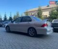 Серый Мицубиси Лансер, объемом двигателя 2 л и пробегом 184 тыс. км за 3999 $, фото 13 на Automoto.ua