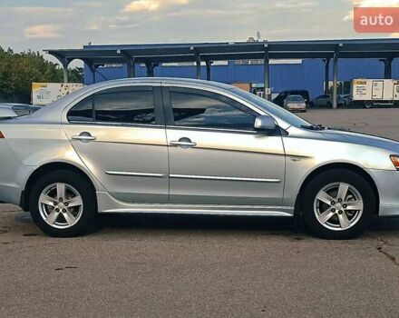 Серый Мицубиси Лансер, объемом двигателя 1.5 л и пробегом 166 тыс. км за 6999 $, фото 1 на Automoto.ua