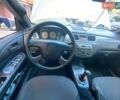 Серый Мицубиси Лансер, объемом двигателя 2 л и пробегом 184 тыс. км за 3999 $, фото 9 на Automoto.ua