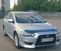 Серый Мицубиси Лансер, объемом двигателя 1.5 л и пробегом 166 тыс. км за 6999 $, фото 6 на Automoto.ua