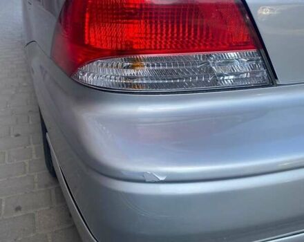 Мицубиси Лансер 2002 в Ивано-Франковске на Automoto.ua Серый Мицубиси Лансер, объемом двигателя 2 л и пробегом 185 тыс. км за 3999 $, фото 3 на Automoto.ua