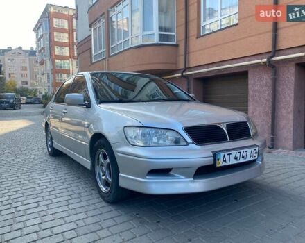 Мицубиси Лансер 2002 в Ивано-Франковске на Automoto.ua Серый Мицубиси Лансер, объемом двигателя 2 л и пробегом 185 тыс. км за 3999 $, фото 9 на Automoto.ua