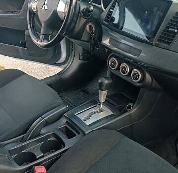 Серый Мицубиси Лансер, объемом двигателя 1.5 л и пробегом 166 тыс. км за 6999 $, фото 2 на Automoto.ua