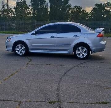 Серый Мицубиси Лансер, объемом двигателя 1.5 л и пробегом 166 тыс. км за 6999 $, фото 5 на Automoto.ua