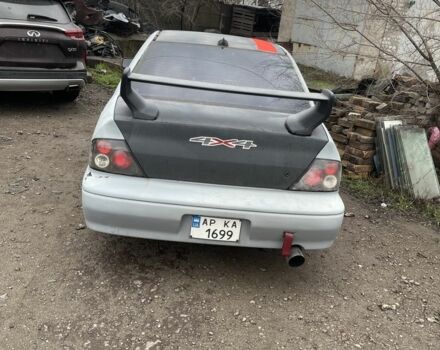 Сірий Міцубісі Lancer, об'ємом двигуна 2 л та пробігом 250 тис. км за 1500 $, фото 2 на Automoto.ua