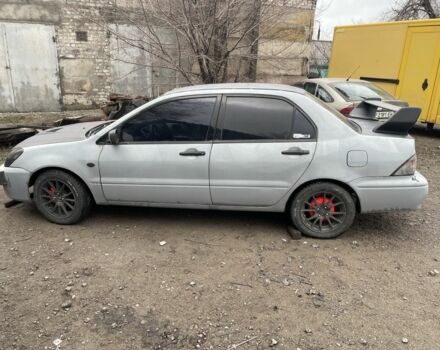 Сірий Міцубісі Lancer, об'ємом двигуна 2 л та пробігом 250 тис. км за 1500 $, фото 1 на Automoto.ua