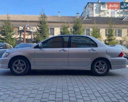 Мицубиси Лансер 2002 в Ивано-Франковске на Automoto.ua Серый Мицубиси Лансер, объемом двигателя 2 л и пробегом 185 тыс. км за 3999 $, фото 12 на Automoto.ua