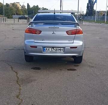 Серый Мицубиси Лансер, объемом двигателя 1.5 л и пробегом 166 тыс. км за 6999 $, фото 3 на Automoto.ua