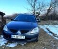 Сірий Міцубісі Lancer, об'ємом двигуна 1.6 л та пробігом 380 тис. км за 3600 $, фото 1 на Automoto.ua