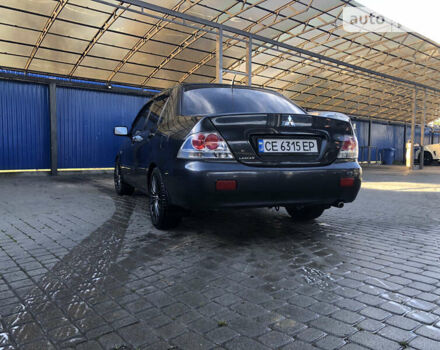 Сірий Міцубісі Lancer, об'ємом двигуна 1.58 л та пробігом 232 тис. км за 2899 $, фото 17 на Automoto.ua