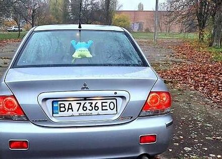 Сірий Міцубісі Lancer, об'ємом двигуна 1.6 л та пробігом 213 тис. км за 4400 $, фото 1 на Automoto.ua