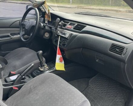 Сірий Міцубісі Lancer, об'ємом двигуна 1.6 л та пробігом 343 тис. км за 3850 $, фото 2 на Automoto.ua