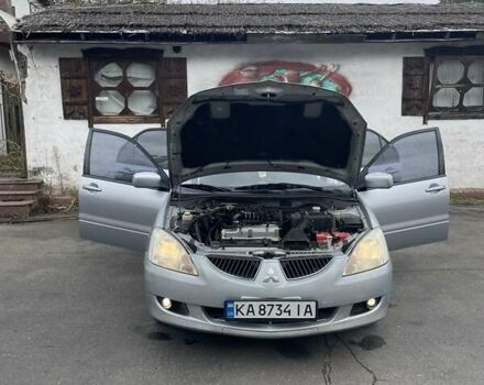 Сірий Міцубісі Lancer, об'ємом двигуна 1.6 л та пробігом 343 тис. км за 3850 $, фото 6 на Automoto.ua