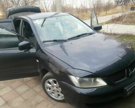 Сірий Міцубісі Lancer, об'ємом двигуна 1.6 л та пробігом 345 тис. км за 0 $, фото 4 на Automoto.ua