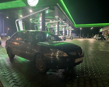 Серый Мицубиси Лансер, объемом двигателя 1.6 л и пробегом 269 тыс. км за 2999 $, фото 1 на Automoto.ua