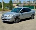 Серый Мицубиси Лансер, объемом двигателя 1.6 л и пробегом 301 тыс. км за 2500 $, фото 1 на Automoto.ua