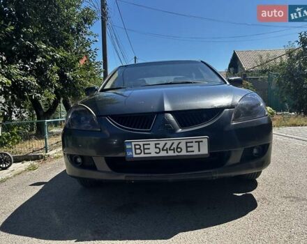 Серый Мицубиси Лансер, объемом двигателя 1.6 л и пробегом 250 тыс. км за 3800 $, фото 4 на Automoto.ua