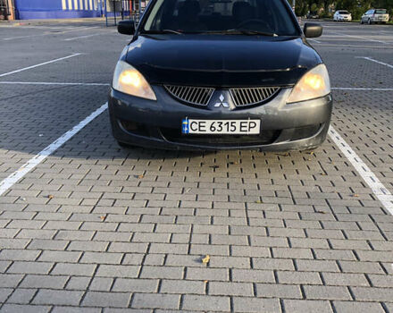 Сірий Міцубісі Lancer, об'ємом двигуна 1.58 л та пробігом 232 тис. км за 2899 $, фото 10 на Automoto.ua