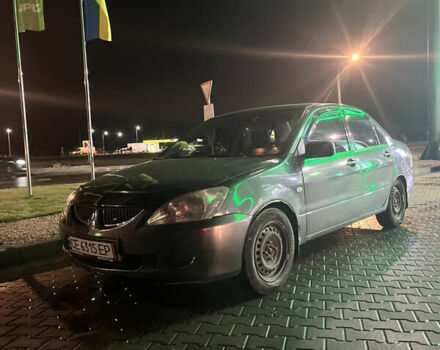 Сірий Міцубісі Lancer, об'ємом двигуна 1.58 л та пробігом 232 тис. км за 2899 $, фото 1 на Automoto.ua