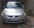 Сірий Міцубісі Lancer, об'ємом двигуна 1.6 л та пробігом 194 тис. км за 4800 $, фото 1 на Automoto.ua
