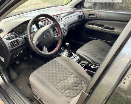 Сірий Міцубісі Lancer, об'ємом двигуна 1.58 л та пробігом 232 тис. км за 2899 $, фото 26 на Automoto.ua