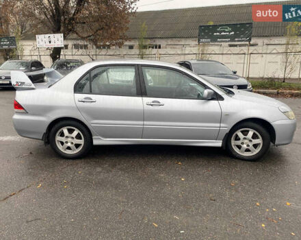 Сірий Міцубісі Lancer, об'ємом двигуна 1.6 л та пробігом 171 тис. км за 4600 $, фото 2 на Automoto.ua