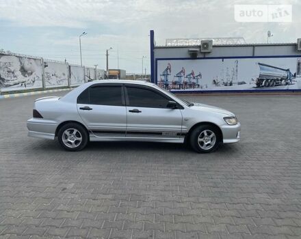 Сірий Міцубісі Lancer, об'ємом двигуна 2 л та пробігом 190 тис. км за 4500 $, фото 32 на Automoto.ua