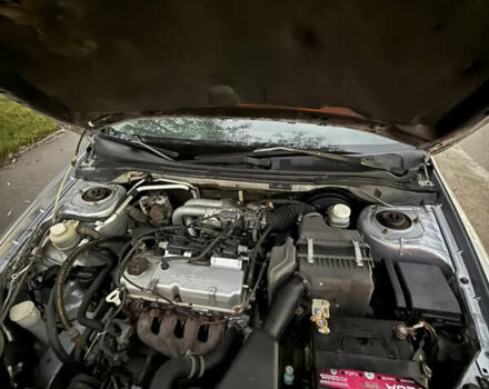 Сірий Міцубісі Lancer, об'ємом двигуна 1.58 л та пробігом 299 тис. км за 3850 $, фото 4 на Automoto.ua