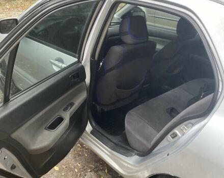 Мицубиси Лансер 2003 в Белой Церкве на Automoto.ua Серый Мицубиси Лансер, объемом двигателя 1.58 л и пробегом 350 тыс. км за 3300 $, фото 12 на Automoto.ua