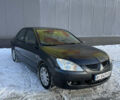 Сірий Міцубісі Lancer, об'ємом двигуна 1.58 л та пробігом 345 тис. км за 3300 $, фото 1 на Automoto.ua