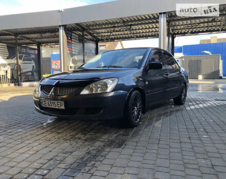 Сірий Міцубісі Lancer, об'ємом двигуна 1.58 л та пробігом 232 тис. км за 2899 $, фото 15 на Automoto.ua