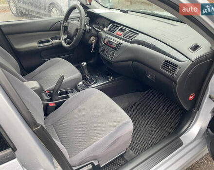Сірий Міцубісі Lancer, об'ємом двигуна 1.6 л та пробігом 171 тис. км за 4600 $, фото 9 на Automoto.ua