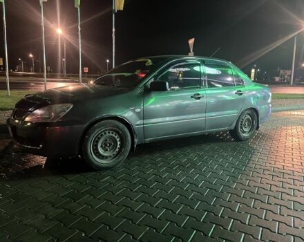 Серый Мицубиси Лансер, объемом двигателя 1.6 л и пробегом 269 тыс. км за 2999 $, фото 5 на Automoto.ua