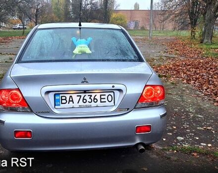 Сірий Міцубісі Lancer, об'ємом двигуна 1.6 л та пробігом 213 тис. км за 4400 $, фото 2 на Automoto.ua