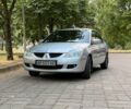 Серый Мицубиси Лансер, объемом двигателя 1.6 л и пробегом 107 тыс. км за 6000 $, фото 1 на Automoto.ua
