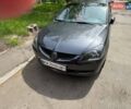 Сірий Міцубісі Lancer, об'ємом двигуна 1.6 л та пробігом 272 тис. км за 5100 $, фото 9 на Automoto.ua