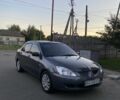Серый Мицубиси Лансер, объемом двигателя 1.6 л и пробегом 300 тыс. км за 3208 $, фото 1 на Automoto.ua