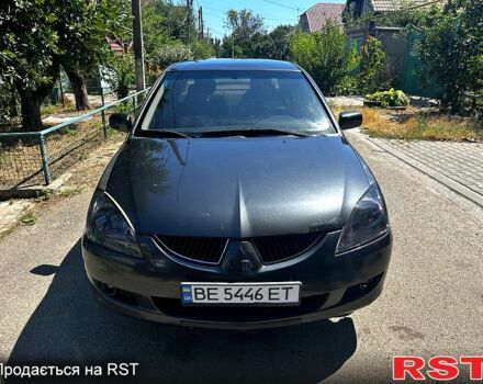 Серый Мицубиси Лансер, объемом двигателя 1.6 л и пробегом 250 тыс. км за 3900 $, фото 5 на Automoto.ua