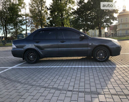 Сірий Міцубісі Lancer, об'ємом двигуна 1.58 л та пробігом 232 тис. км за 2899 $, фото 11 на Automoto.ua
